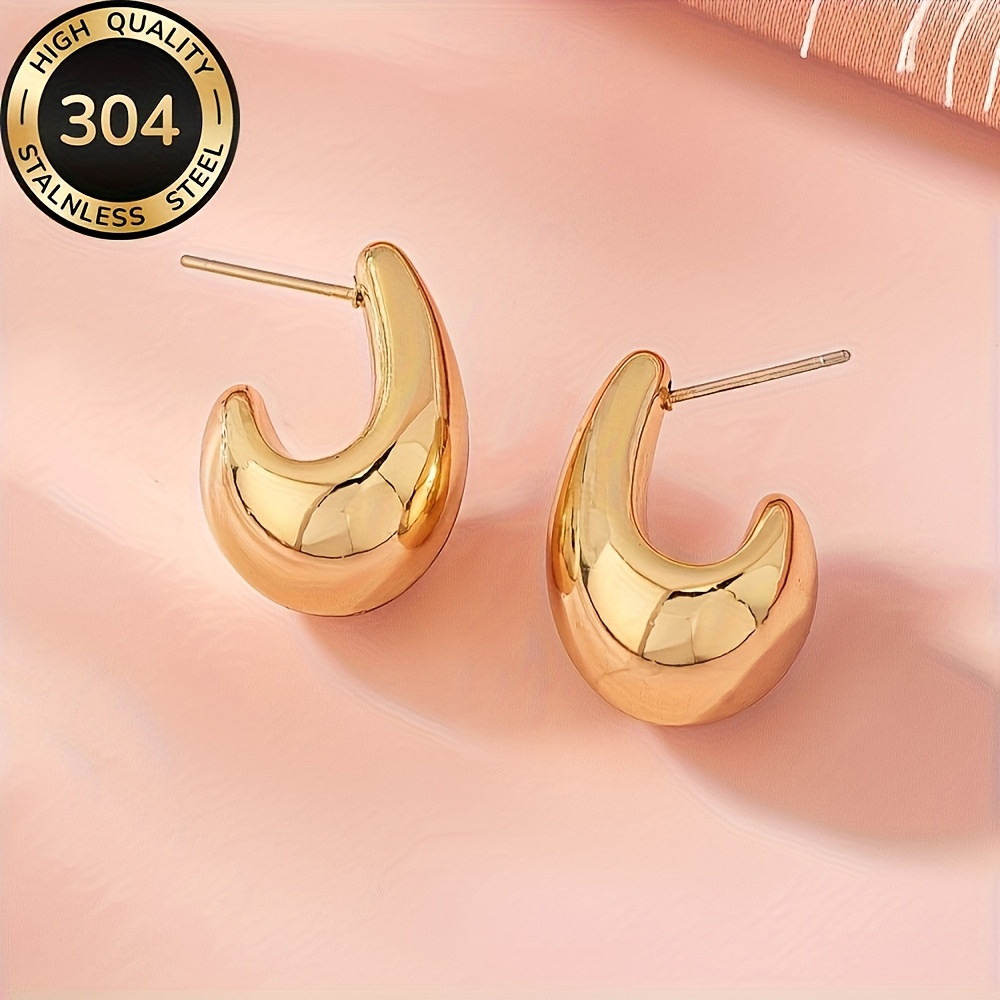 Women's High-Quality Stainless Steel Golden Hollow Water Drop Earrings
